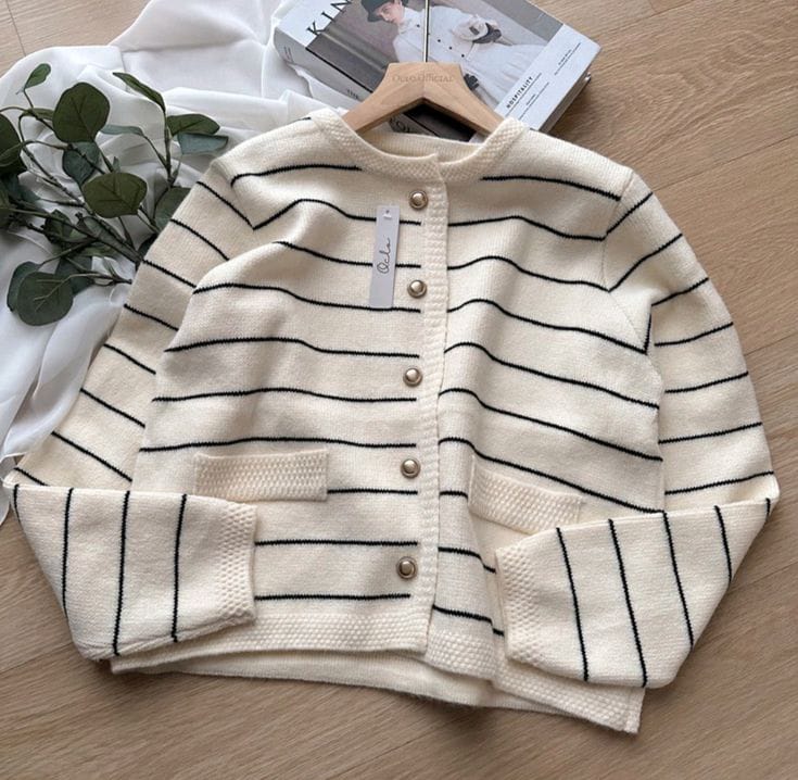 جاكت حريمي بزراير