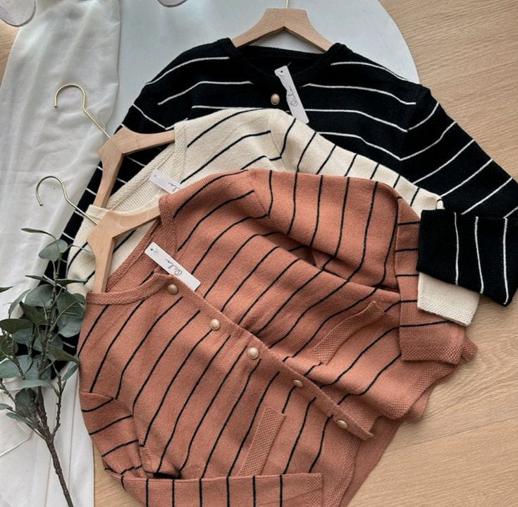 جاكت حريمي بزراير